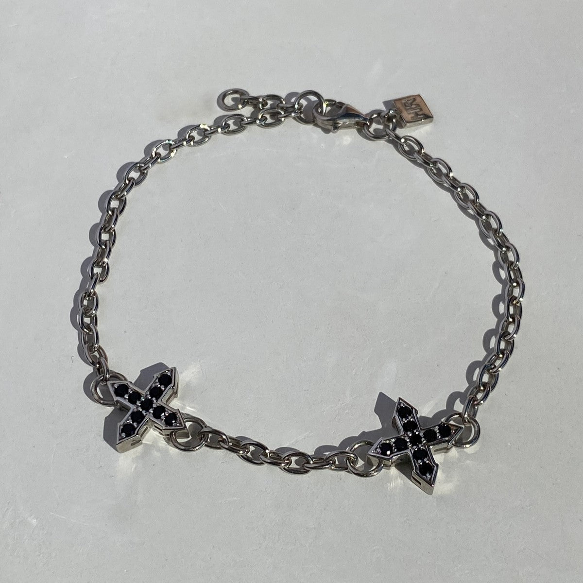 CHAIN BRACELET "TWO STARS "GLOW" WITH BLACK SPINEL / SILVER