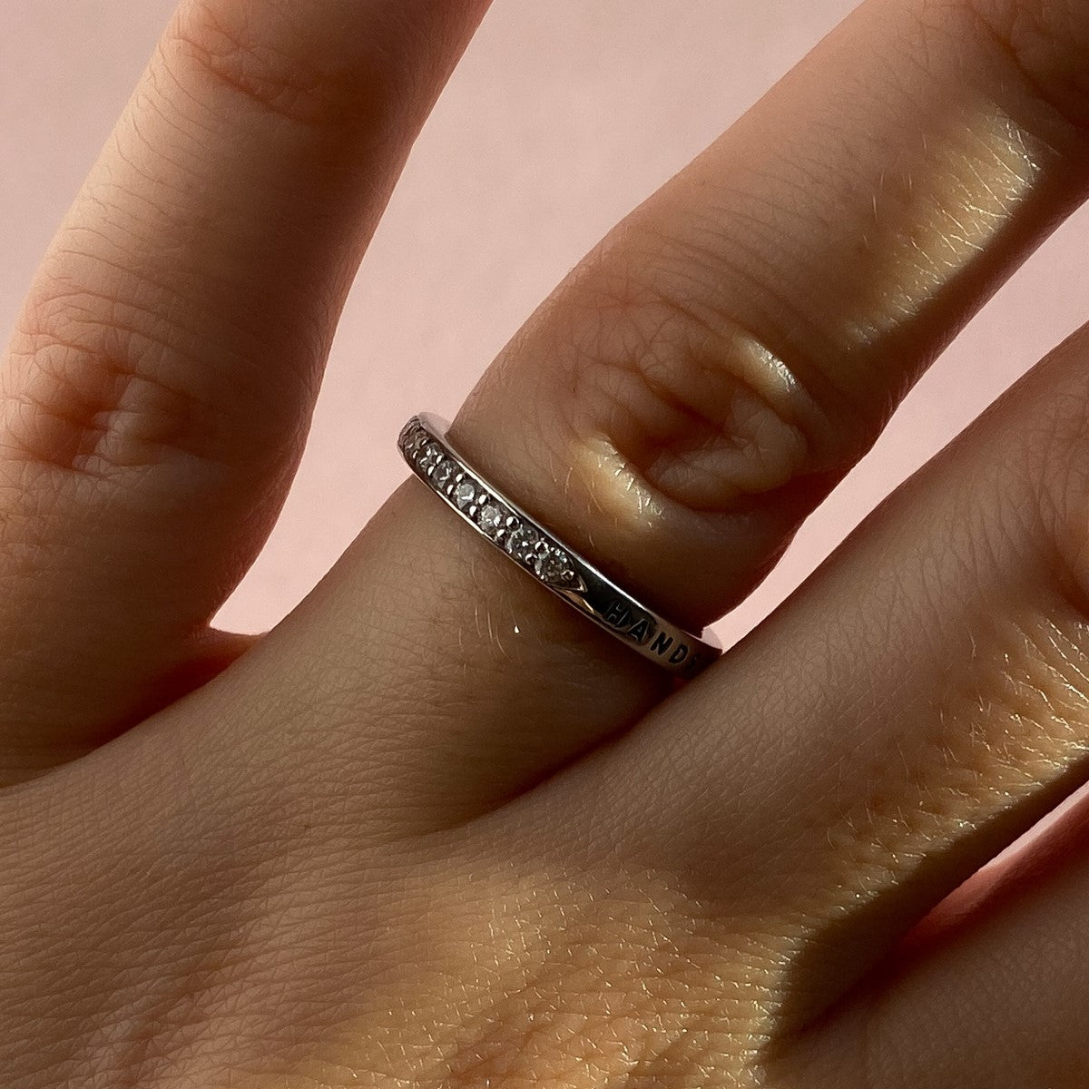 RING "MEMORIES" WITH A HALF CIRCLE OF MOISSANITE | SILVER