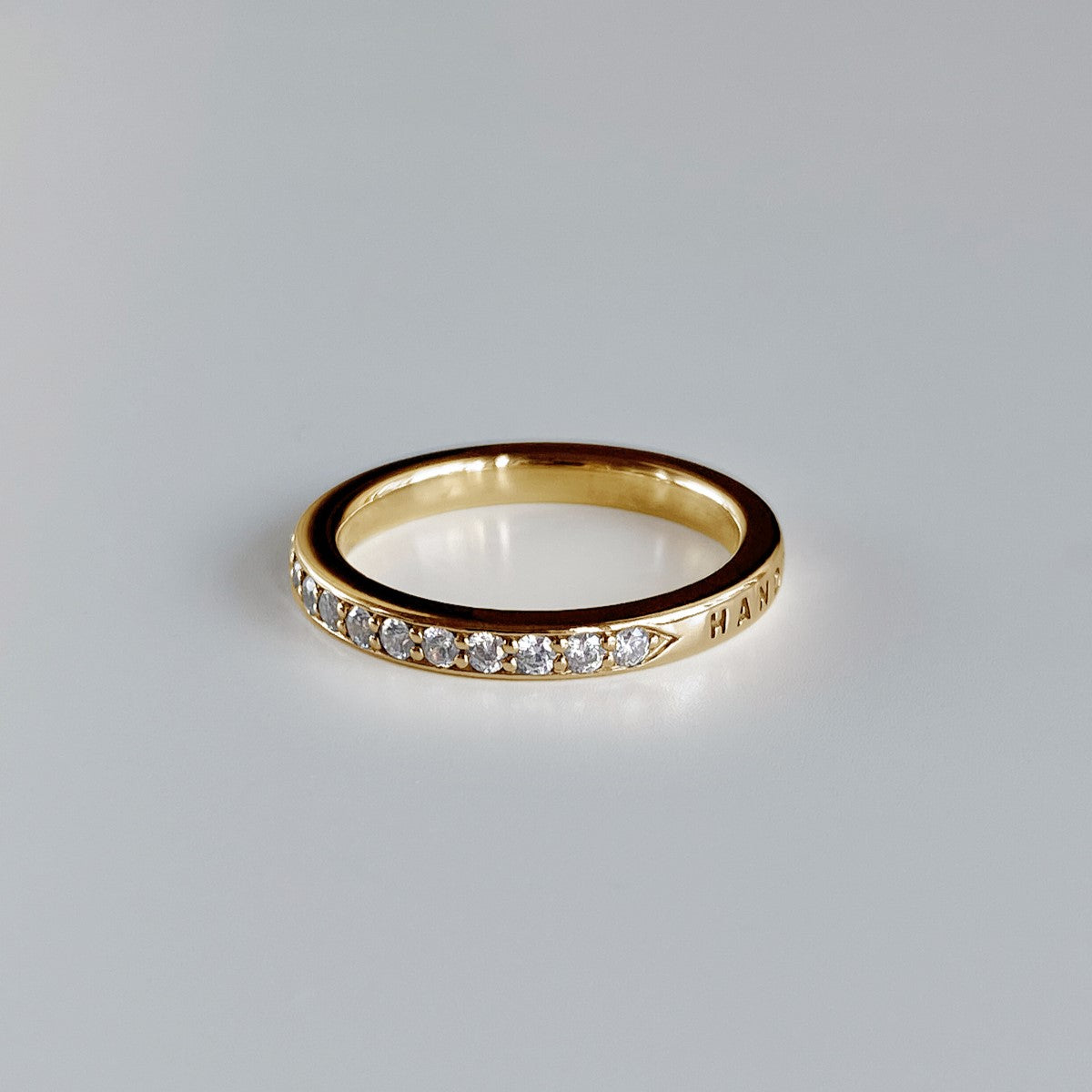 RING "MEMORIES" WITH A HALF CIRCLE OF MOISSANITE | GOLD