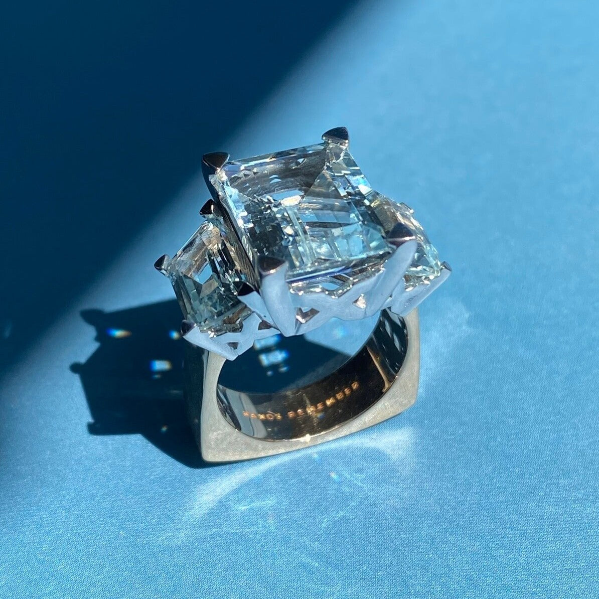 RING "XXX" WITH AQUAMARINES / SOLID GOLD