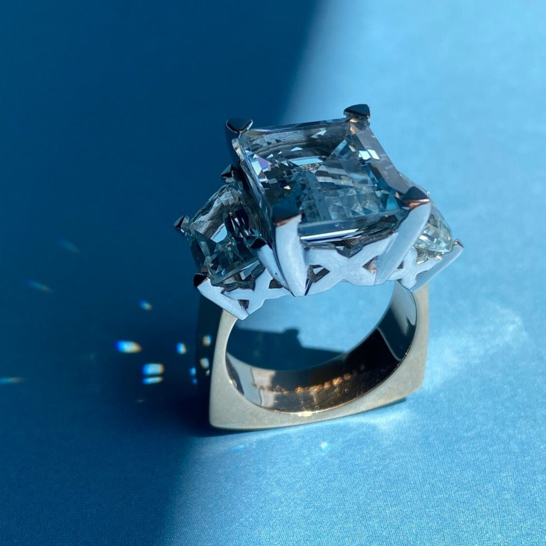 RING "XXX" WITH AQUAMARINES / SOLID GOLD