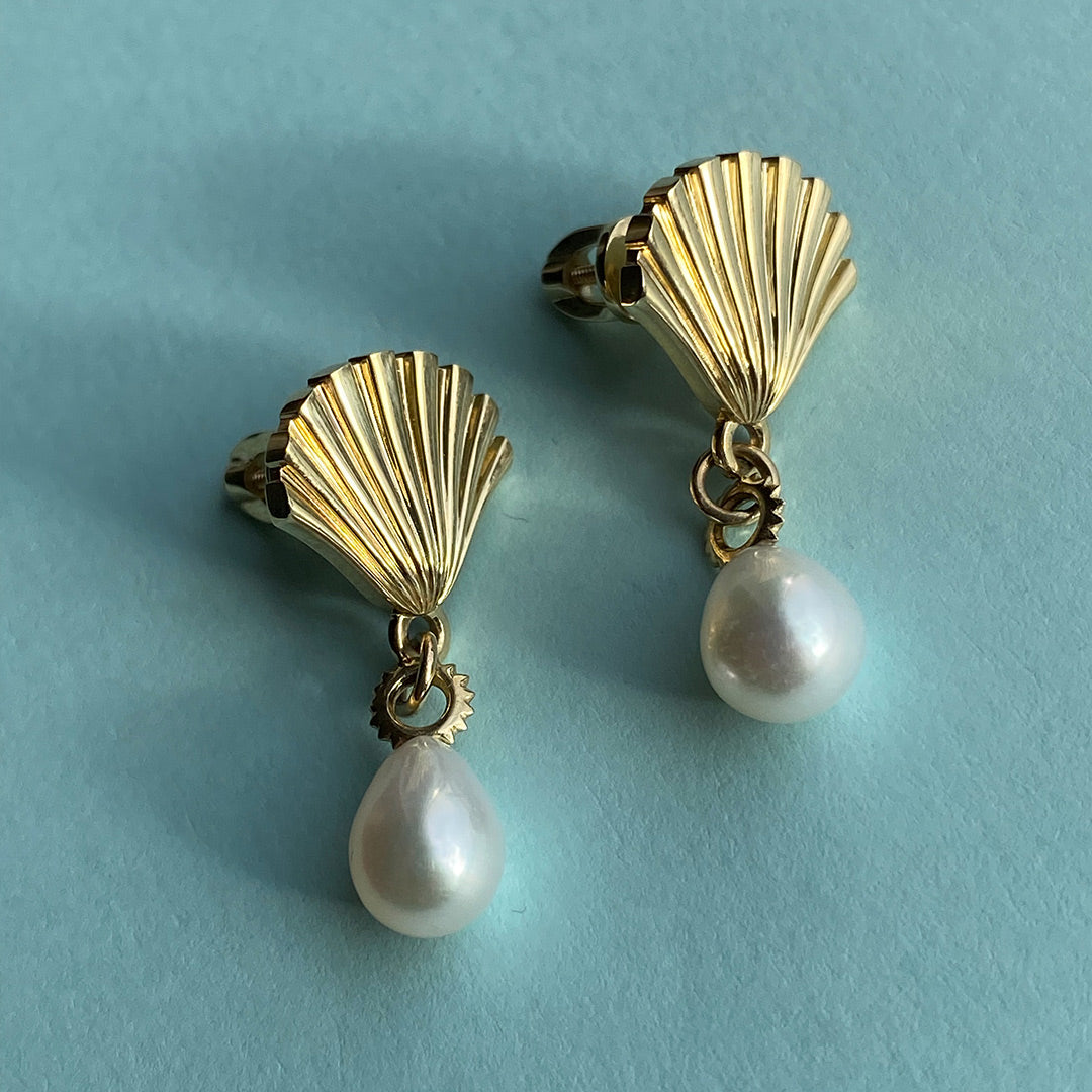 Solid Gold earring with pearl retailer and green gems