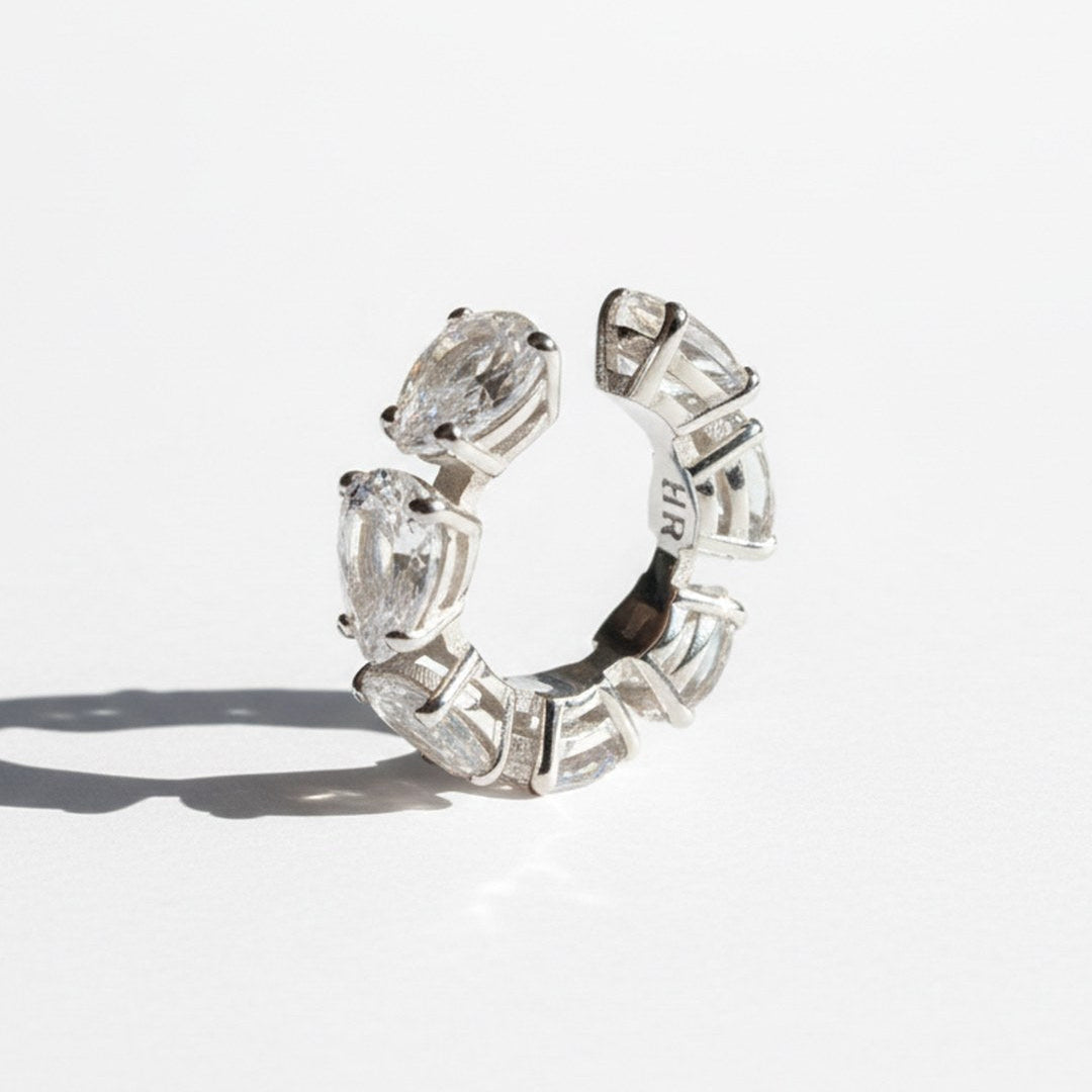 Minerals Maxi ear cuff in sterling silver with 7 pear-cut rock crystals, front view.