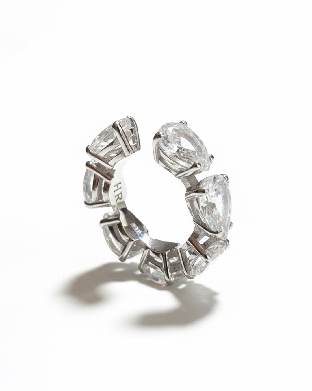 Minerals Maxi ear cuff in sterling silver with 7 pear-cut rock crystals, angled front view.