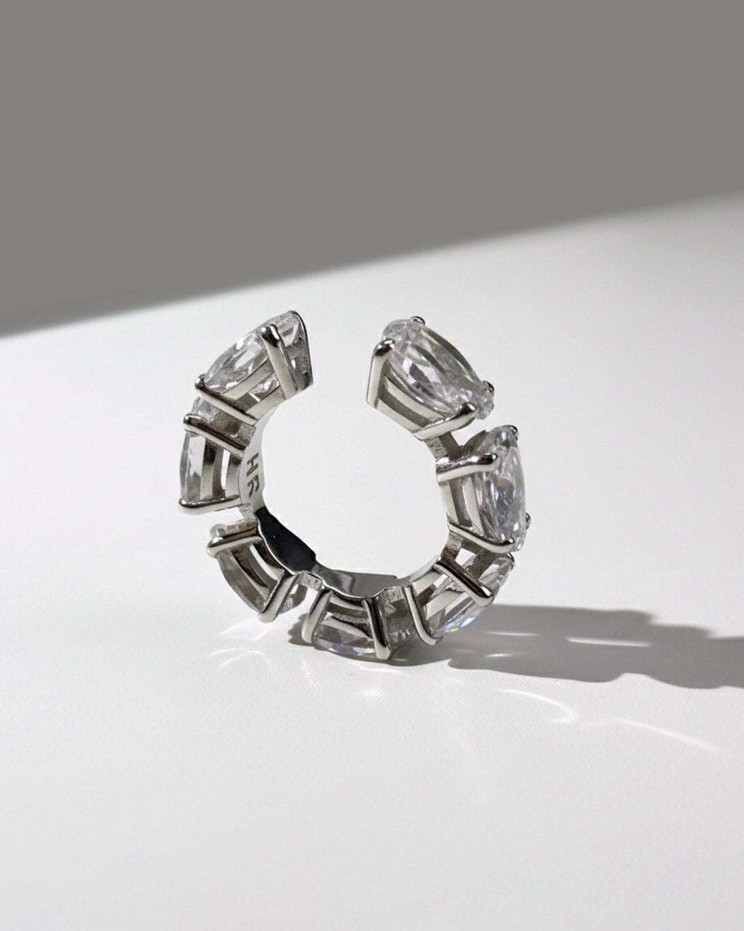 Minerals Maxi ear cuff in sterling silver with 7 pear-cut rock crystals, back view.