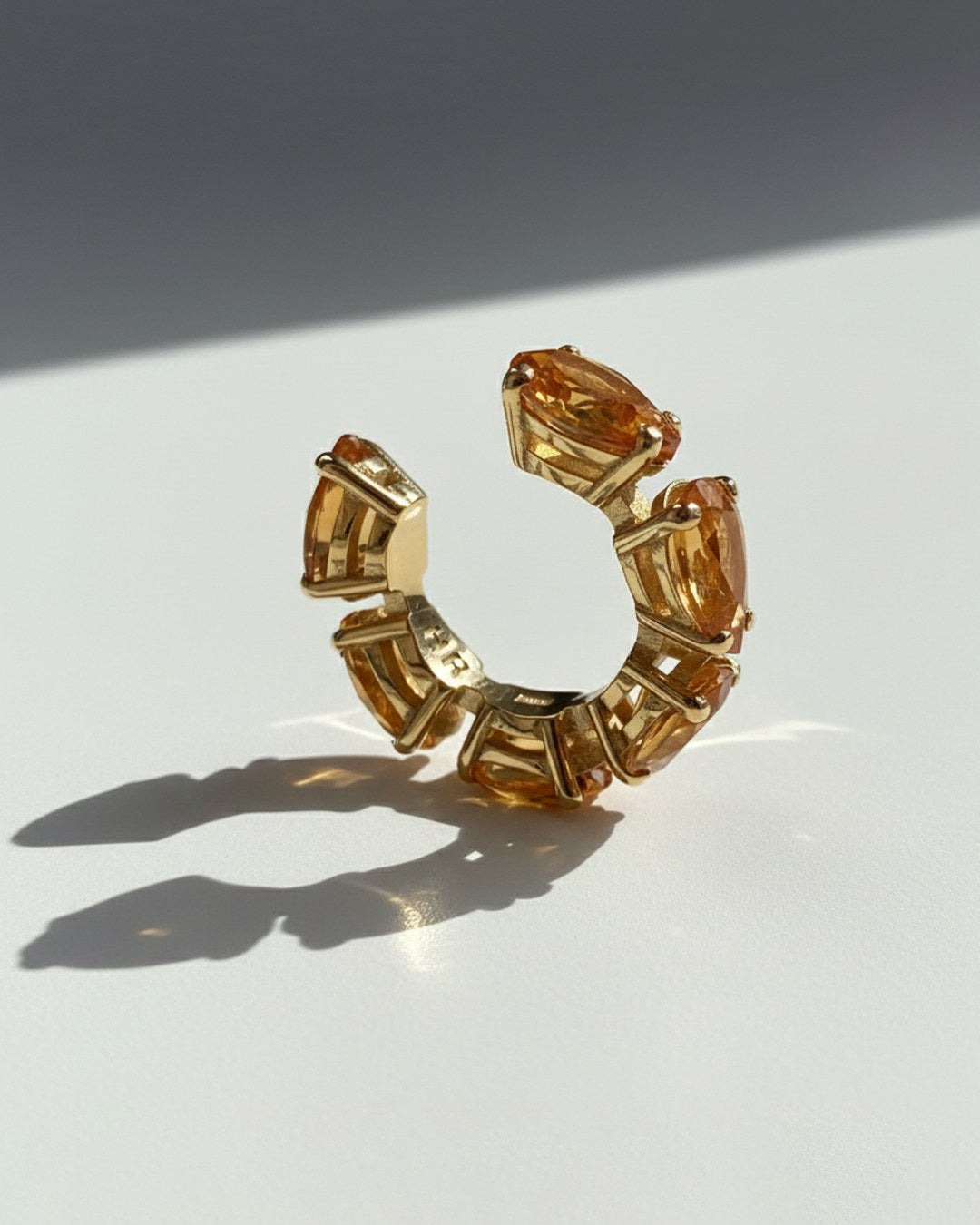 Minerals Mini ear cuff in gold-plated sterling silver with 6 pear-cut yellow citrines, side-back view.
