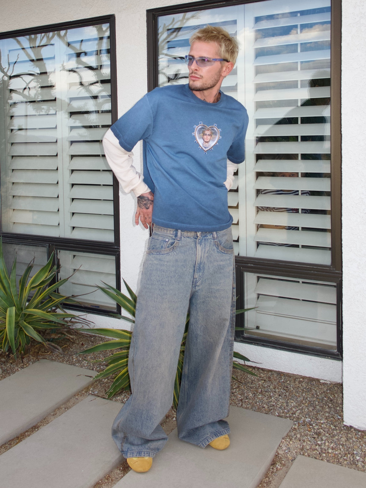 Blue long-sleeve T-shirt with the Oscar in My Heart print and contrasting white sleeves, three-quarter front view