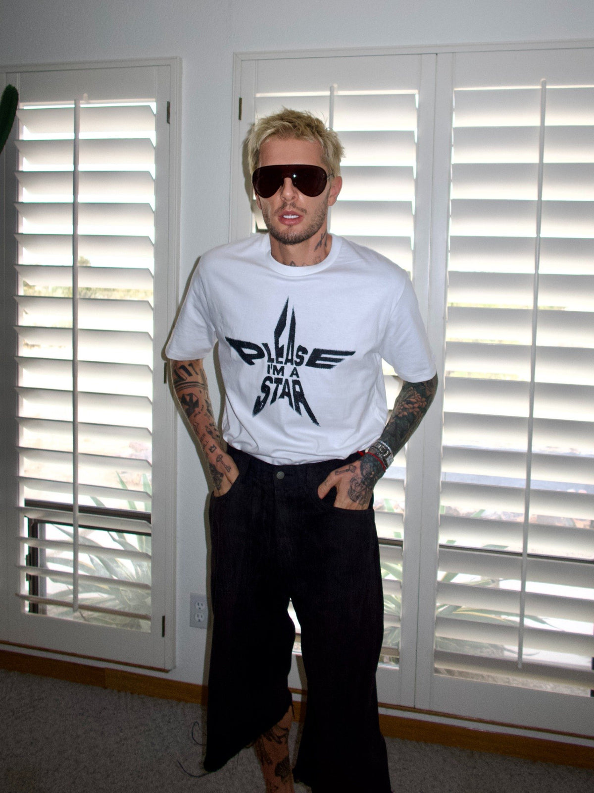 White T-shirt with the “Please, I’m a Star” statement graphic, full-length front view.